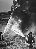 Army Soldiers Demonstrating Newly Developed Flame Throwers That Thrust Flaming Inferno For 35 Yards Photographic Poster Print by Andreas Feininger, 18x24