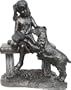 Young Girl Sits on Bench with Dog Sculpture