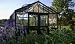 Exaco Retro/Windsor Greenhouse With Fancy 4 Mm Thick Decorative Side-Wall Panels:10 Feet 2 Inch w x 15 Feet Long x 9 Feet High, 79 Inch Side Walls, 4 Mm Tempered Glass, 4 Roof Windows A Set Of Double Turning Doors With Heavy Closers, Large Bottom Frame/Base, Large Gutters With Down Spouts, Misting System