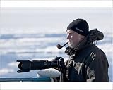 Photographic Prints of Pipe smoking photographer in a wooly hat on holiday in the Arctic from ArcticPhoto