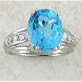 14K White Gold Oval Swiss Blue Topaz Ring with Diamond Band by The Jewelers Collection
