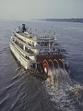 The Delta Queen, a Steamboat, Makes its Way up the Mississippi River Photographic Poster Print by Ira Block, 12x16