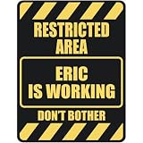  RESTRICTED AREA ERIC IS WORKING  PARKING SIGN