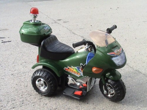 Childrens Toyshop  Toys : Ride on kids toy battery powered rechargeable junior police trike - Green