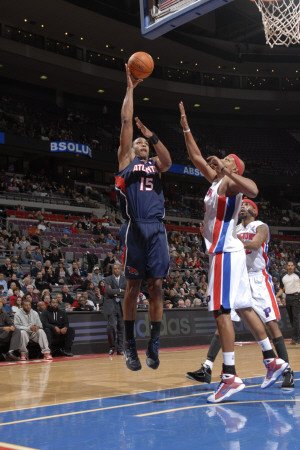 Atlanta Hawks v Detroit Pistons: Al Horford and Charlie Villanueva Photographic Poster Print by Allen Einstein, 12x18