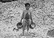 A Child Gathers Oysters, Biloxi, 1911 Photograph - Beautiful 16"x20" Photographic Print from the Library of Congress Collection