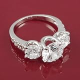 Silvertone Three Round-cut CZ Fashion Ring