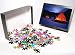 Photo Jigsaw Puzzle of Tilley lamps light two man pyramid tents at night on the snow in Antarctica, from Robert Harding