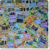 100 Assorted Pokemon Cards with Foils & Bonus Mew Promo!