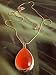 Fashion necklace 719 orange pendant on gold colour chain