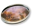 View of the Rocky Mountains - Oval Glass Paperweight