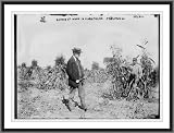 Newswire Photo S Gaynor holding shovel in cornfields St. James L.I.
