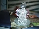 BLOWN GLASS ANGEL WITH HALO ON ROUND MIRROR BASE
