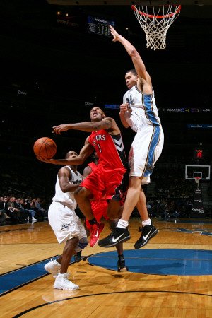 Toronto Raptors v Washington Wizards: Jarrett Jack, JaVale McGee and Gilbert Arenas Photographic Poster Print by Ned Dishman, 12x18