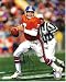 John Elway Autographed Denver Broncos 8x10 Photo (orange jersey rolling out)