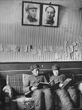 Stationery Store Manager and University Representative Going over Accounts Photographic Poster Print by George Lacks, 30x40