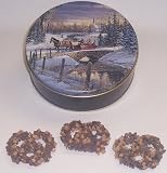 Scott's Cakes 1 lb. Dark Chocolate Covered Pretzel with Chocolate Chips & Peanut Butter Chips in a Sleigh Ride Tin