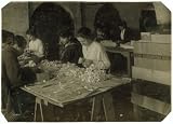 Photo Mary Diamond, 15 years old on right of photo making roses at the Boston Floral Supply Co., 347-357 Cambridge