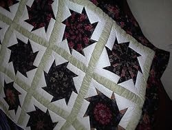 Black Floral Stack 'N Whack bed quilt
