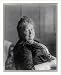 Historic Print (M): [Amelia E. Barr, half-length portrait, seated]