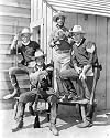 SAMMY DAVIS JR. AS JONAH WILLIAMS, PETER LAWFORD AS SERGEANT LARRY BARRETT, FRANK SINATRA AS FIRST-SERGEANT MIKE MERRY, DEAN MARTIN AS SERGEANT CHIP DEAL FROM SERGEANTS 3 #1 - BLACK & WHITE Movie Photo- MEDIUM Size Print - SIZE 14x11" (36x28cm)