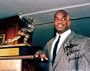 Rashaan Salaam Colorado Buffaloes Autographed 8x10 Holding Trophy Photo w/ Inscription "Heisman 94"