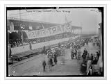 Newswire Photo (L): Vanderbilt Cup Auto Race, cars and crowd on track before beginning of race