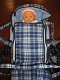DOLLS PRAM WITH 16 BABY DOLL!.