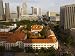 Overhead of Historic Raffles Hotel and Singapore Skyline Photographic Poster Print by Glenn Beanland, 24x18