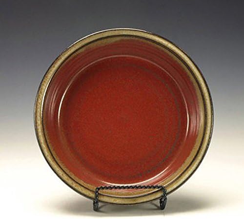 Stoneware pie plate. Iron red and cream.