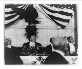 Historic Print (L): [President Taft at dinner, with eagle and U.S. flag behind him]