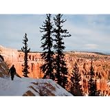 A Hiker Walks Along a Ledge in Winter Next to Bryce Amphitheater, Bryce Canyon National... by AllPosters.com