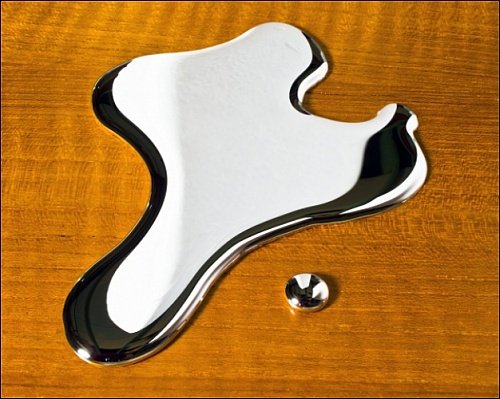 Photographic Prints of Pool of liquid mercury from Science Photo Library