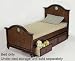 Twin Size Bed with Antique Brass Portholes in Antique Honey Brown Oak Finish