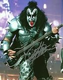 GENE SIMMONS OF KISS AUTOGRAPHED 8 X 10 ACTION PACKED PHOTO