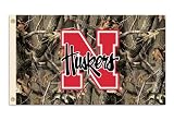 NCAA Nebraska Cornhuskers 3-by-5 Foot Flag with Grommets - Realtree Camo Background
