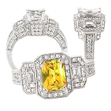 18k Chatham 7x5mm emerald cut yellow sapphire color #2 engagement ring with split shank 18k Chatham 7x5mm emerald cut yellow sapphire color #2 engagement ring with split shank