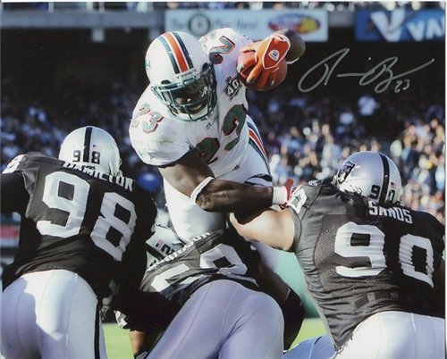 Ronnie Brown Autographed/Hand Signed Miami Dolphins Dive vs Raiders 8x10 Photo