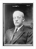 Newswire Photo (L): Portrait bust, name illegible