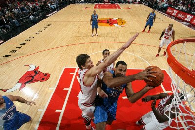 Orlando Magic v Chicago Bulls: Malik Allen and Kyle Korver Photographic Poster Print by Gary Dineen, 24x36