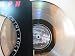 Search : Triumph - Rock & Roll Machine (Silver-colored vinyl record)