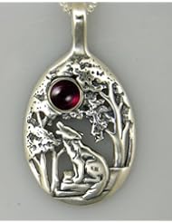 A Stunning Sterling Silver Howling Wolf Howling Pendant Accented with a Genuine Garnet