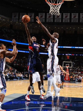 Atlanta Hawks v New Jersey Nets: Jamal Crawford and Johan Petro Photographic Poster Print by Jesse D. Garrabrant, 30x40