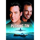 Pushing Tin