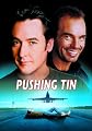 Pushing Tin