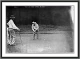 Historic Print (M): [William H. Taft, full length, facing slightly left, bending over to hit golf ball, with