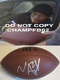 NNAMDI ASOMUGHA,PHILADELPHIA EAGLES,OAKLAND RAIDERS,CAL BEARS,SIGNED NFL FOOTBALL WITH PROOF + COA