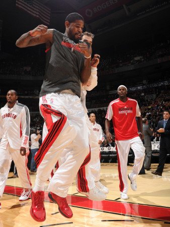 Philadelphia 76ers v Toronto Raptors: Amir Johnson and Jose Calderon Photographic Poster Print by Ron Turenne, 9x12