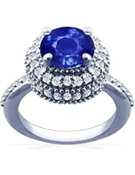 Platinum Round Cut Blue Sapphire Ring With Sidestones