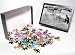 Photo Jigsaw Puzzle of ATLANTIC CITY THE SANDMAN. A man making sculptures and messages in the sand on from Granger Art on Demand